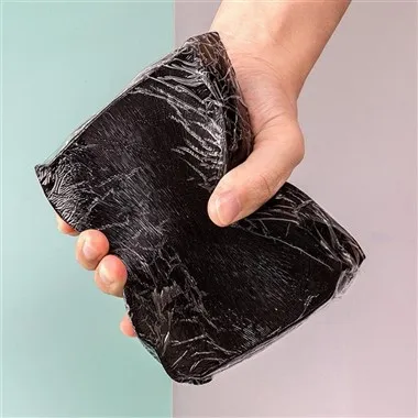 Självhäftande förbandsdyna